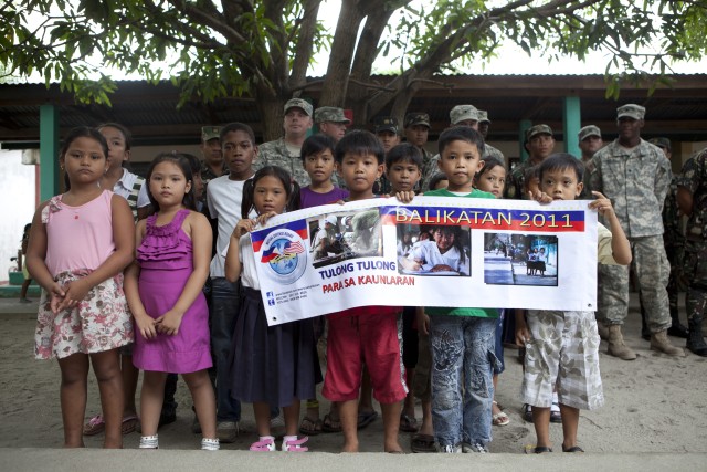 Pundakit Integrated school poses for the groundbreaking ceremony