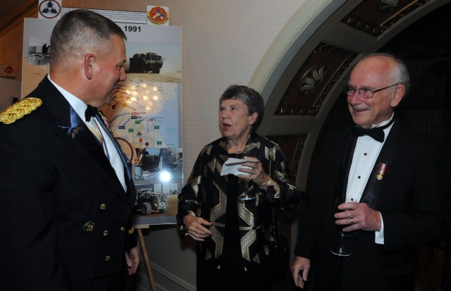 Maj. Gen. Raymond Mason, the U.S. Army Forces Command logistics officer, talks to retired Lt. Gen. Kenneth Lewi, who commanded the 3d Sustainment Command (Expeditionary) from 1981 until 1983, during the 3d ESC's 60th Anniversary Ball March 24 at...