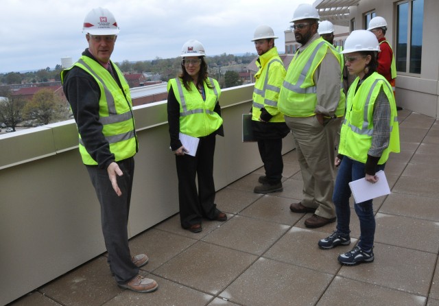 DPW team tours FORSCOM/USARC building to assess custodial and recycling needs 