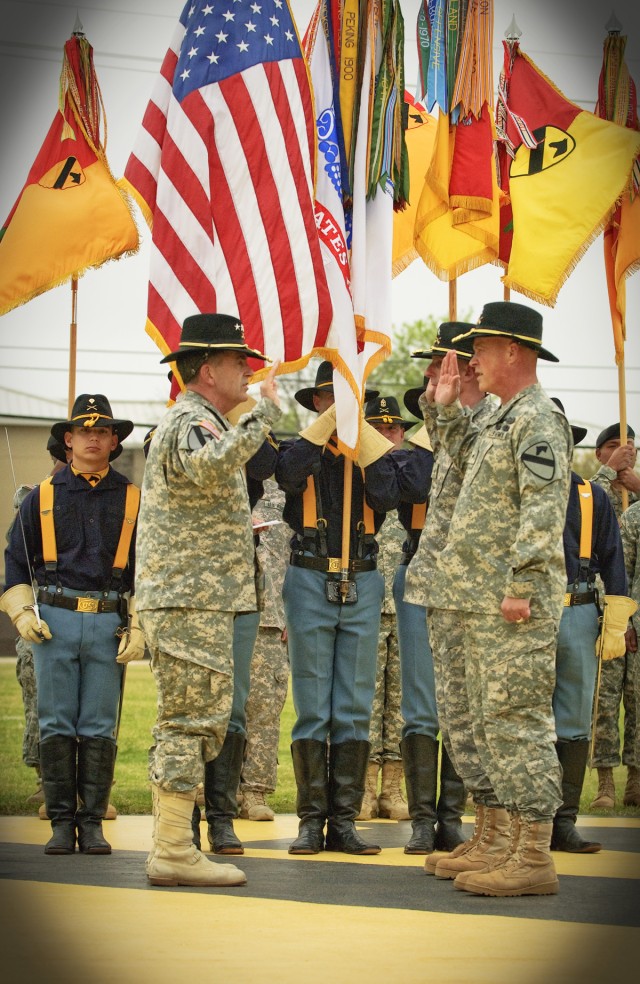 FORT HOOD, Texas-General Peter Chiarelli (left), current Vice Chief of Staff of the Army, gives the oath of office to Brig. Gen. Gary Volesky, deputy commanding general of maneuver, and Brig. Gen. James Richardson, deputy commanding general -...