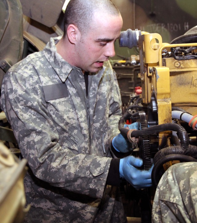 Alaska mechanics help update Army repair manual  