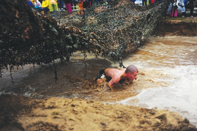 Runners get dirty during Big Sur Mud Run 2011