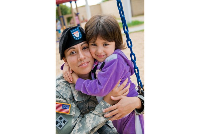 Spc. Ellane Marquez and daughter