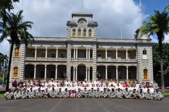 Army Reservists from the 9th Mission Support Command's 100th Battalion, 442nd Infantry Regiment, join World War II veterans from the 100th Infantry Battalion, 442nd Regimental Combat Team and the Military Intelligence Service March 28, at Iolani...