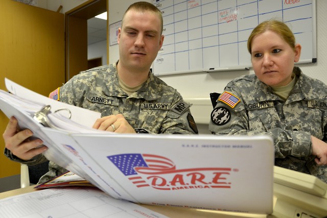 Sgt. Mark Arnett and Spc. Kathy Ogburn