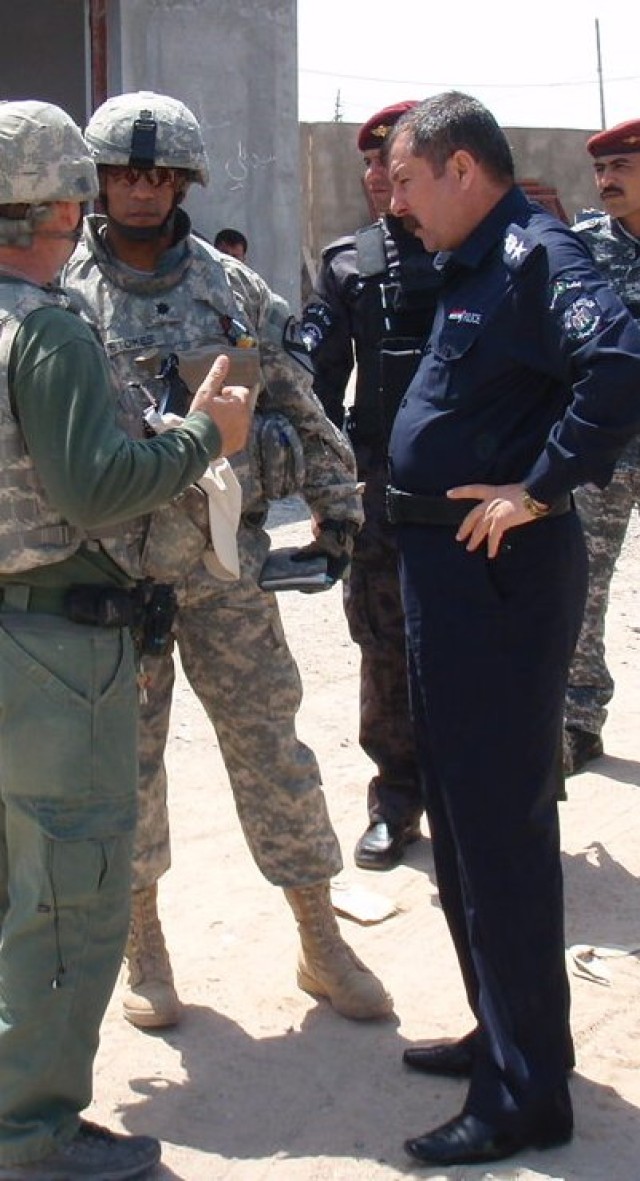 Stokes talks with locals