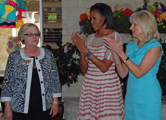 Obama and Biden applaud Warrior Family Support Center manager