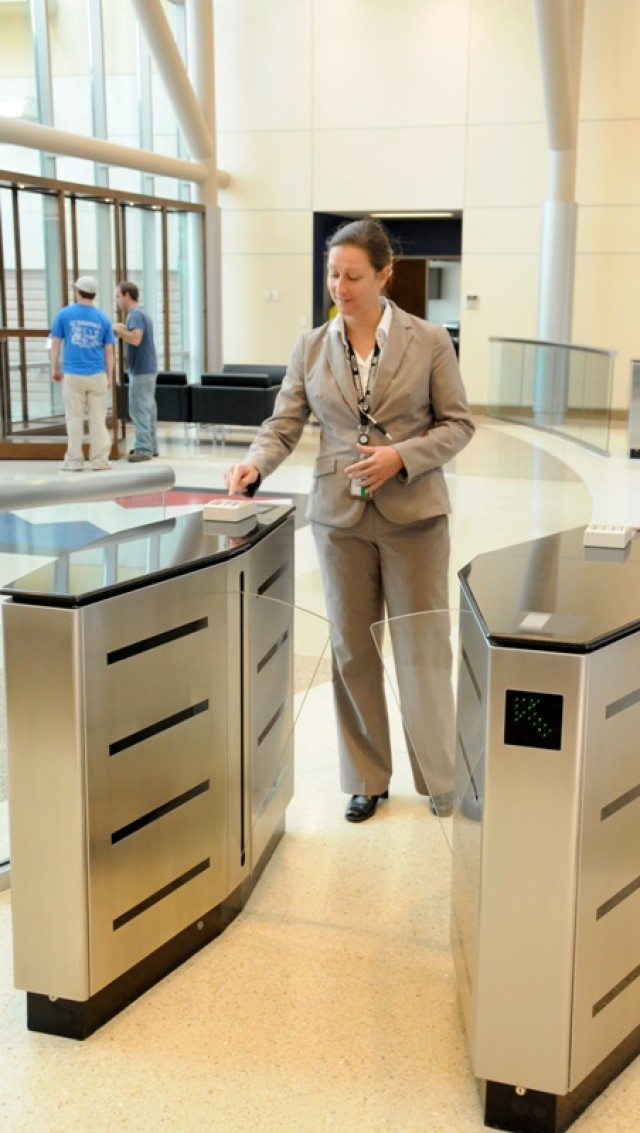 Security assistance workers tour their new building
