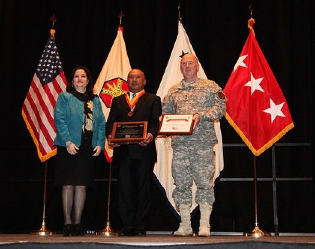 Stalwart Award-winner Pratya Siriwat stands between Ms. Hammack and Lt. Gen. Lynch