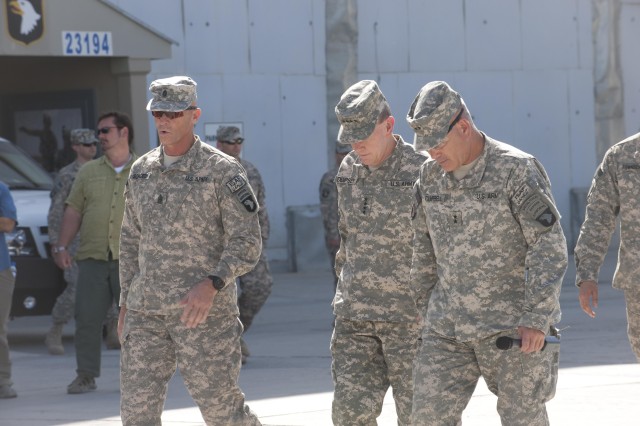 Dempsey walks with Campbell, Schroeder