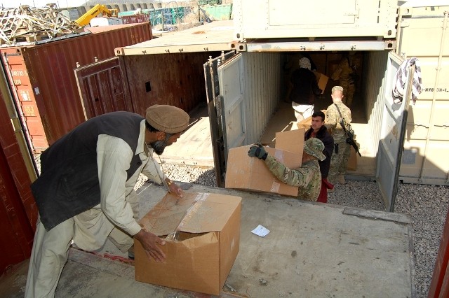 Soldiers, ANSF, distribute 6,000 coats to rural Afghans