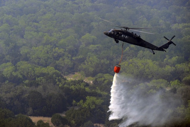 Texas Guard Black Hawk drops water