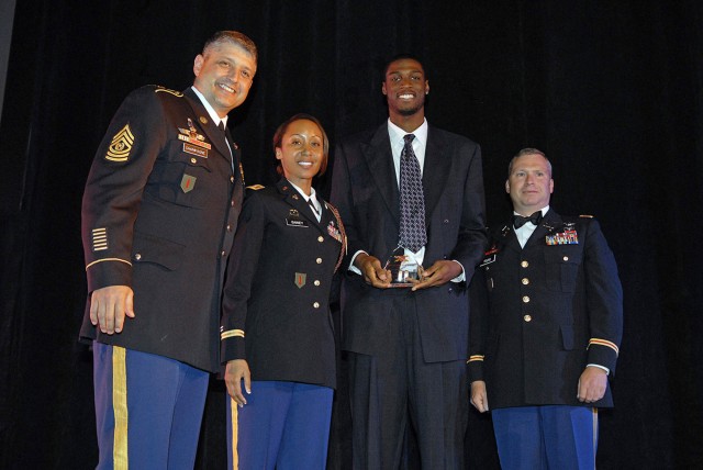 Deployed Field Artillerymen recognize K-State basketball player