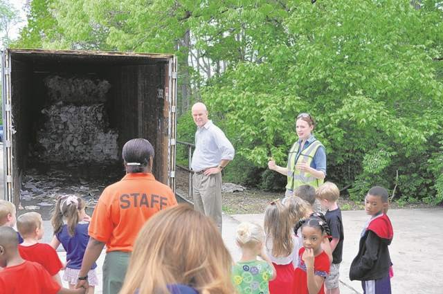 students tour recycling facility