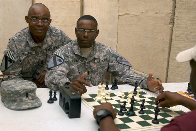 CONTINGENCY OPERATING BASE ADDER, Iraq - 1st Lt. Shelby Johnson, the executive officer of B Company, 3rd Brigade Special Troops Battalion, 3rd Advise and Assist Brigade, 1st Cavalry Division, poses with Command Sgt. Maj. Ricky Wallace, the...