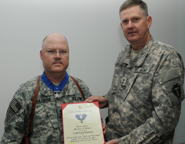 Sgt. Maj. Larry Rayburn receives the Texas Medal of Valor