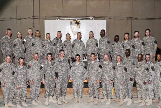 CONTINGENCY OPERATING BASE ADDER, Iraq - Maj. Gen. Eddy Spurgin, front and fifth from left, the commanding general of United States Division - South and Maj. Gen. Daniel Allyn, front and sixth from right, the commanding general of the 1st Cavalry Div...