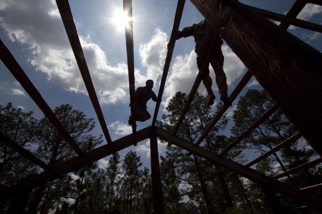 Paratrooper teams assault obstacle course in 2011 All American Week Team Assault Competition