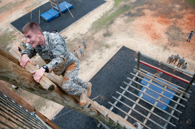 Paratrooper teams assault obstacle course in 2011 All American Week Team Assault Competition