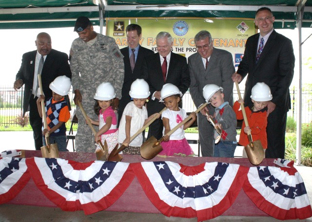 Gates keeps promise, helps break ground on new Fort Riley school