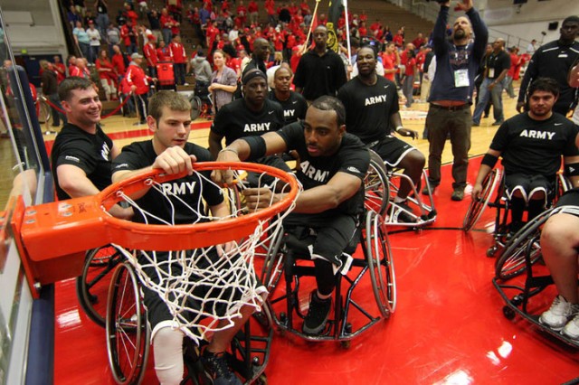 Army wheelchair team cuts down net