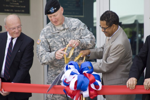 Gen. Robert W. Cone TRADOC commander cuts ribbon with Newport News mayor