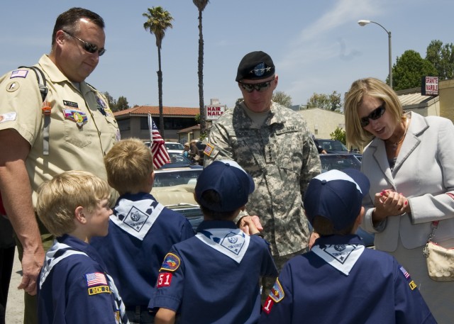 Gen. Robert W. Cone and Mrs. Jill Cone at the Armed Forces Day Parade 01