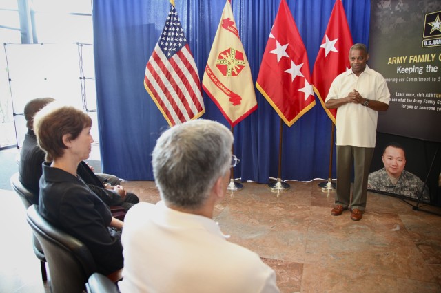Maj. Gen. Reuben Jones speaks to Gen.and Mrs. Casey