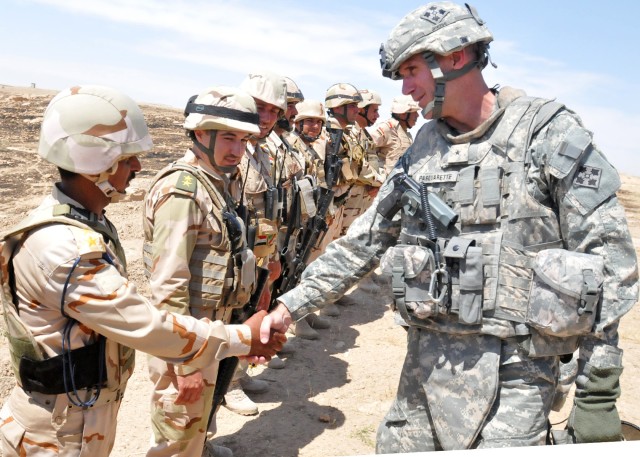 Brig. Gen. Pasquarette congratulates IA soldier