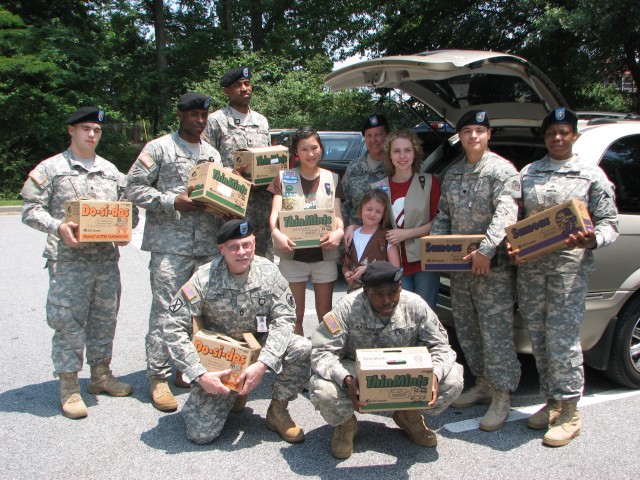 Cookies for a cause: Girl Scouts donate 540 boxes