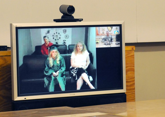 Deployed dad watches daughter graduate high school via teleconference