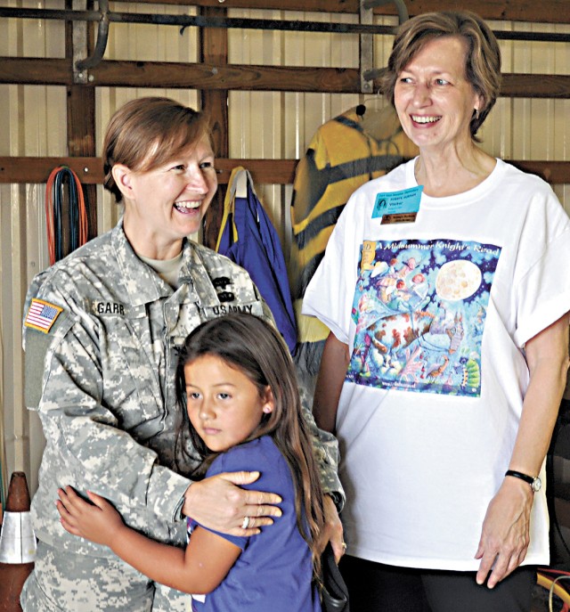Col. Mary Garr, 502nd MSG commander, at Library