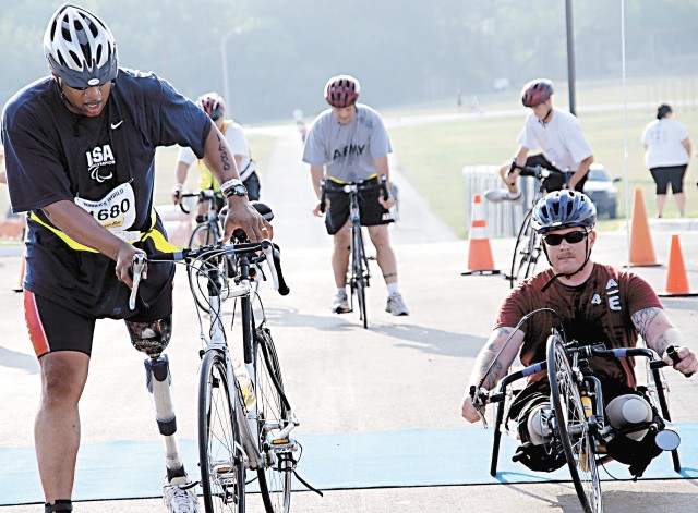Wounded warriors cross the finish line during CFI Minitry