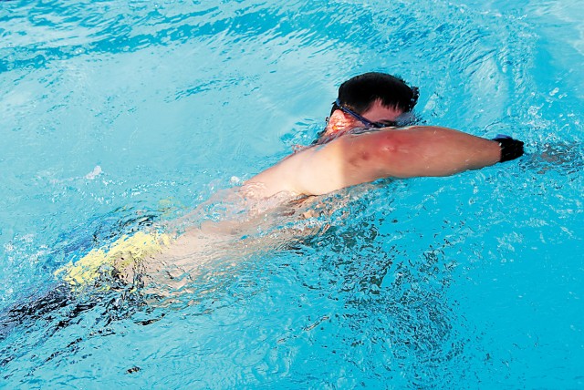 Wounded warrior swims during Minitry at CFI