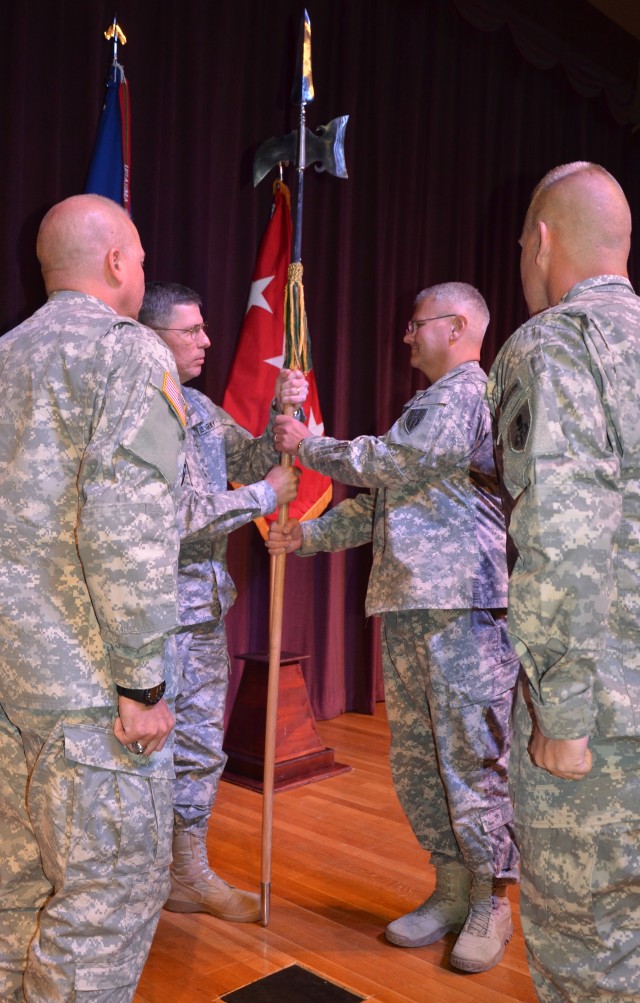 USASMA's new top enlisted Noncommissioned officer, Command Sgt. Maj. Rory L. Malloy, receives the halberd from Deputy Commanding General and Chief of Staff, U.S. Army Training and Doctrine Command, Lt