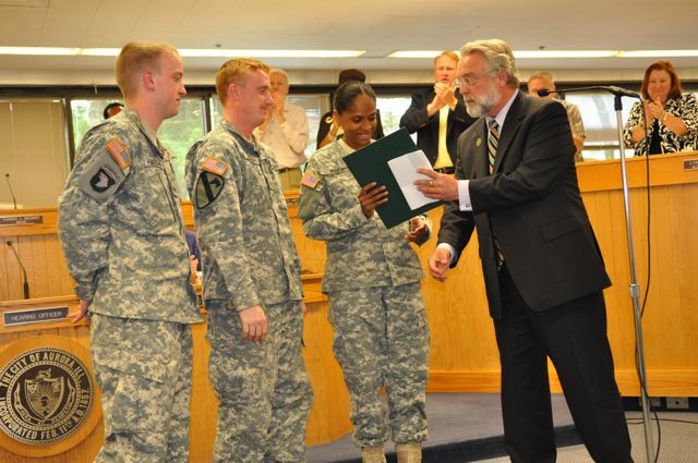 Mayor Tim Weisner presents the Army Birthday Proclamation to Aurora Recruiting Station Commander, SFC Muse