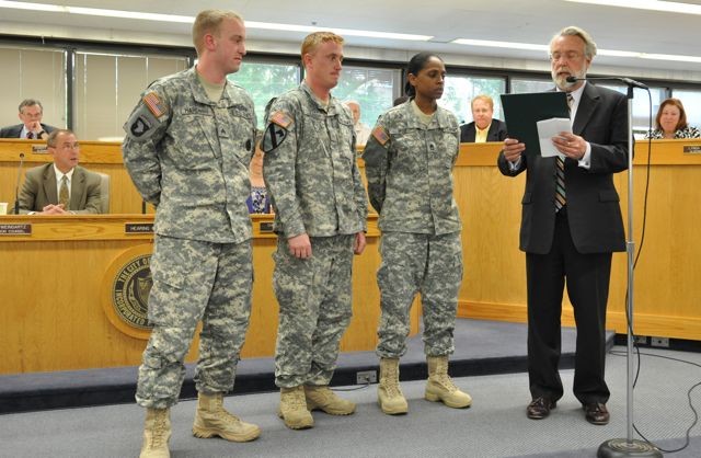 Mayor Tim Weisner reads the Army Birthday Proclamation to Aurora citizens and council members