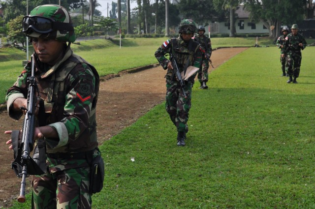 Indonesian Soldiers conduct an area search