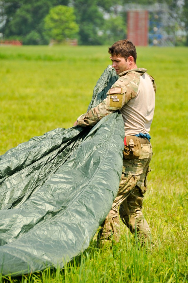 Parachutist collects gear