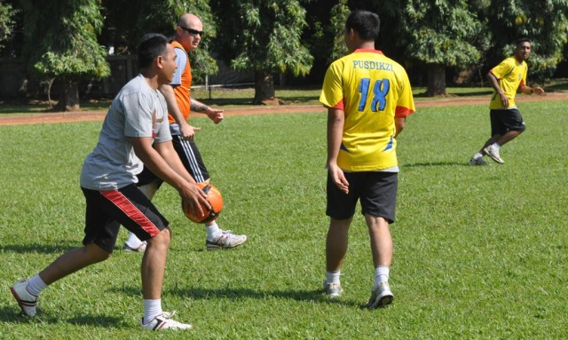 US and Indonesian Soldiers enjoy a fast-paced game of soccer