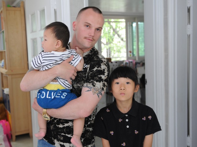 Soldier volunteers at orphanage for seven years