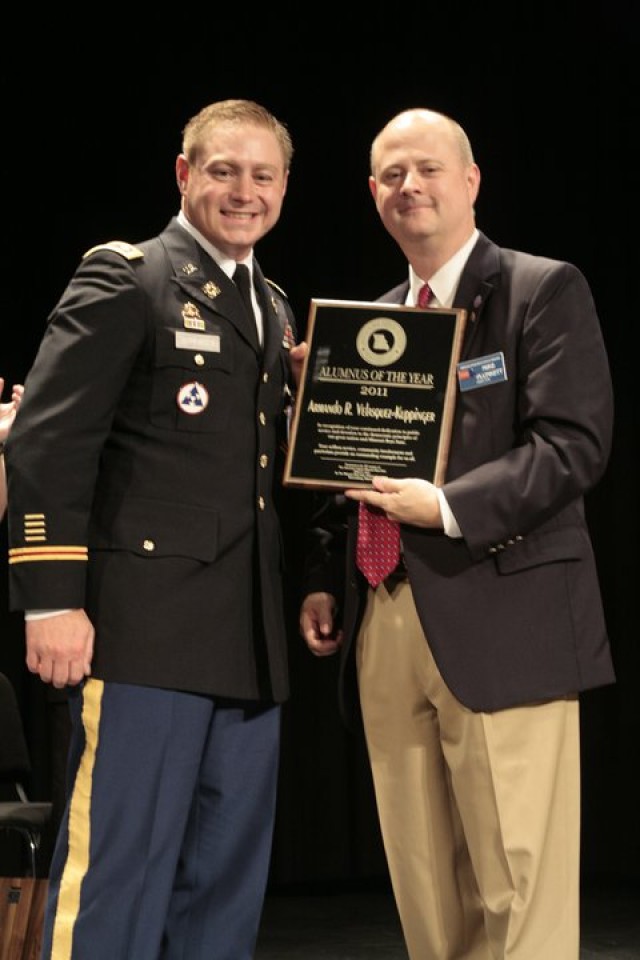 Commander recognized for military service, volunteer work