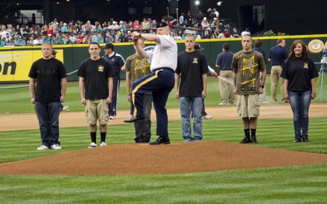 CSM Troxell rifles first pitch across home plate