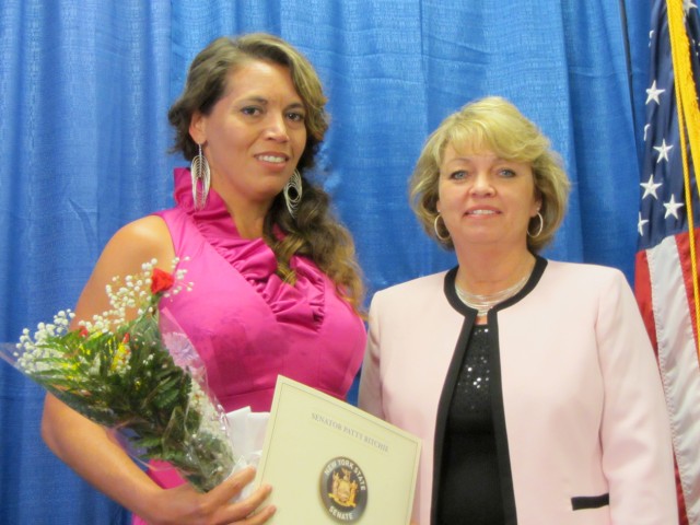 Angelica Robinson, New York 2011 Women of Distinction nominee, poses with state Sen. Patty Ritchie, 48th District, during the Women of Distinction celebration June 9 at the Children's Home of Jefferson County in Watertown. Robinson was among the 15 n...