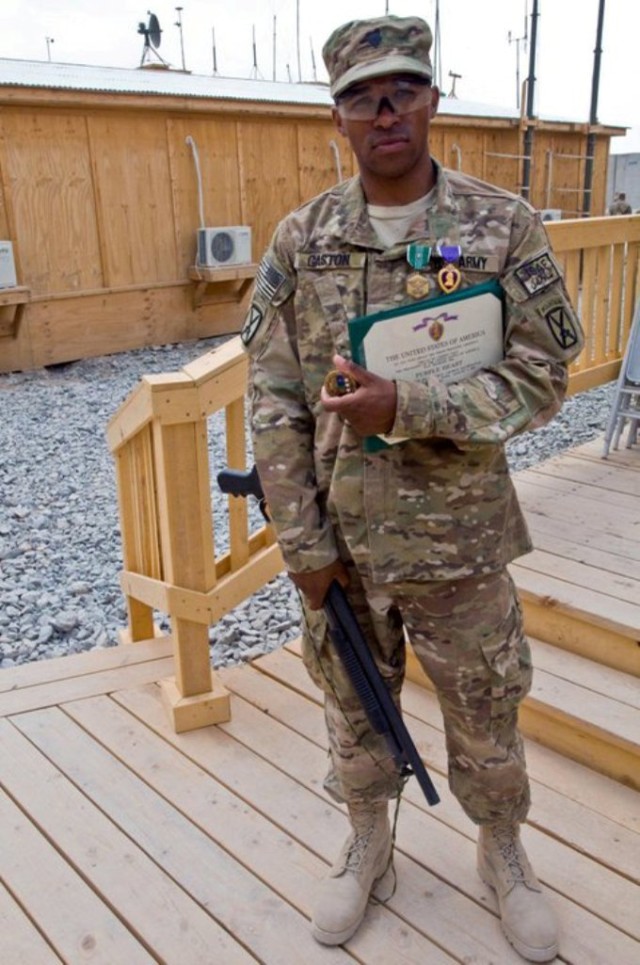 Spc. Antony Gaston, combat engineer, A Company, 3rd Brigade Special Troops Battalion, 3rd Brigade Combat Team, poses for a photo after an award ceremony June 14 at Forward Operating Base Pasab, Afghanistan. Gaston was awarded a medal for his valorous...