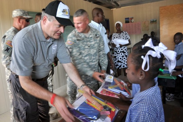 Stansberry helps distribute donated school supplies