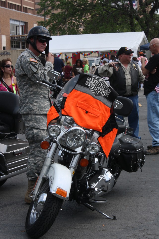 CSM Ciotola dons his motorcycle safety protective gear at the Fiesta de los Veteranos motorcycle ride and rally April 9.