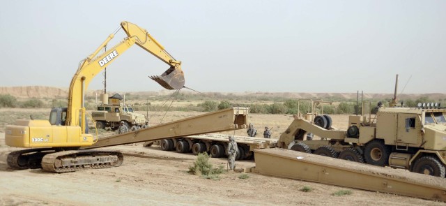 Engineers remove temporary bridge in Kirkuk province