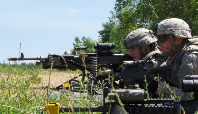 Soldiers from 2nd Battalion, 14th Infantry Regiment, 2nd Brigade Combat Team, provide security while conducting a training mission on Fort Drum. The mission is part of a field training exercise in which 2-14 Infantry Soldiers will remain in the...