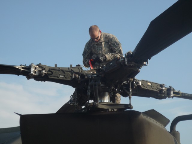 "Junkyard Dogs" keep Apaches in the air